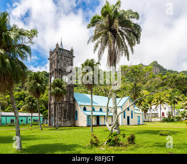 Sacred Heart Roman Catholic Church with a Clock tower. Colourful vibrant old colonial capital of Fiji: Levuka town, Ovalau island, Lomaiviti archipela Stock Photo