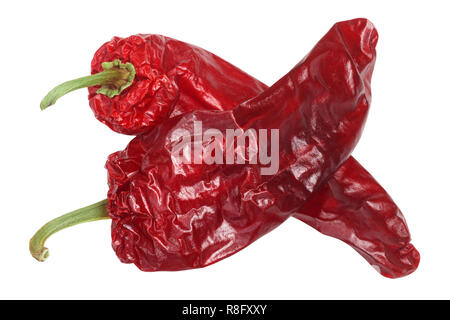 Dried Aleppo pepper, whole pods crossed, top view Stock Photo