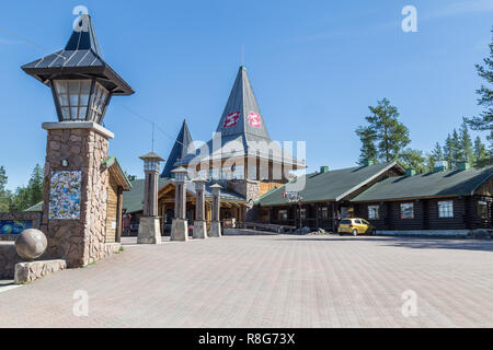 ROVANIEMI, FINLAND - JULY 22, 2016: Santa Claus holiday village and artic circle line in Rovaniemi. Finland Stock Photo