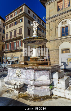 Florence, Italy - September 27, 2018: Fountain on Piazza di Santa Croce on sunny day in Florence. Italy Stock Photo