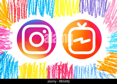 Kiev, Ukraine - November 16, 2018: Circle Instagram and Instagram TV (IGTV) icons printed on paper with pastel hand drawn art frame Stock Photo