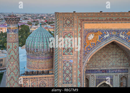 Detail, facade of Sher Dor madrasa, Registan, Samarkand, Uzbekistan Stock Photo