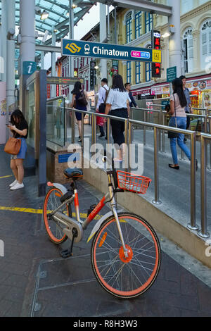 Entrance to Chinatown MRT station, Chinatown, Singapore, a bicycle of a bike-sharing company in front Stock Photo