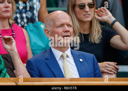 Politician William Hague watches during the Wimbledon Championships 2018 Stock Photo