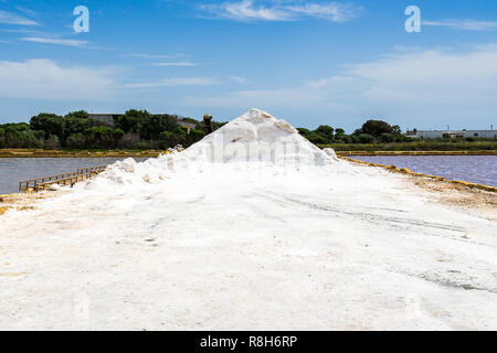 Pyramid of salt at Trapani and Paceco salt flats, Sicily, Italy Stock Photo