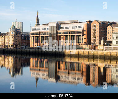 Newcastle crown court building reflected in the river Tyne, north east England, UK Stock Photo