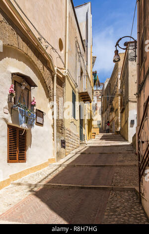 Colorful uphill street in Sciacca historic centre, Sicily, Italy Stock Photo