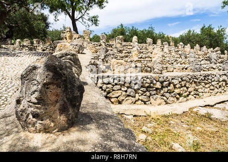 Close-up of a face carved on the rock at Enchanted Castle (Castello Incantato) with the sculptures of Filippo Bentivegna, Sciacca, Sicily, Italy Stock Photo