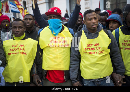 Rome, Italy. 15th Dec, 2018. December 15, 2018 - Rome - Italy -The big demonstration of men and women made ''invisible'' by anti-social norms that continue to produce poverty, unemployment, war between people already impoverished and homeless has been held in Rome: students, workers, laborers, domestic workers, caregivers, refugees, porters, asylum seekers, third sector workers, solidarity men and women. Credit: Danilo Balducci/ZUMA Wire/Alamy Live News Stock Photo