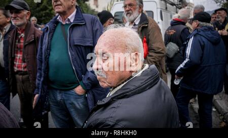 Athens, Greece. 15th Dec, 2018. An elderly man seen taking part in the demonstration during a rally against further cuts.Thousands of pensioners took to the streets as they marched towards Greek Prime Minister's office, demanding reimbursement of all deductions that have been affected in their retirement as part of austerity measures. Credit: Loannis Alexopoulos/SOPA Images/ZUMA Wire/Alamy Live News Credit: ZUMA Press, Inc./Alamy Live News Stock Photo