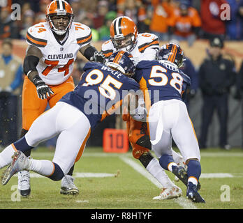 Denver, Colorado, USA. 15th Dec, 2018. Browns QB BAKER MAYFIELD, center, gets sacked by Broncos OLB VON MILLER during the 2nd. Half at Broncos Stadium at Mile High Saturday evening. The Browns beat the Broncos 17-16. Credit: Hector Acevedo/ZUMA Wire/Alamy Live News Stock Photo