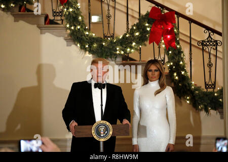 Washington, United States Of America. 15th Dec, 2018. United States President Donald J. Trump makes remarks as First lady Melania Trump looks on at the Congressional Ball at White House in Washington, DC on December 15, 2018. Credit: Yuri Gripas/Pool via CNP | usage worldwide Credit: dpa/Alamy Live News Stock Photo