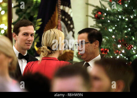 Washington, United States Of America. 15th Dec, 2018. United States Secretary of the Treasury Steven T. Mnunchin (R) talks to First Daughter and Advisor to the President Ivanka Trump and her husband Senior Advisor Jared Kushner at the Congressional Ball at White House in Washington on December 15, 2018. Credit: Yuri Gripas/Pool via CNP | usage worldwide Credit: dpa/Alamy Live News Stock Photo