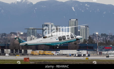 Richmond, British Columbia, Canada. 25th Oct, 2017. An AgustaWestland AW139 helicopter (C-GKSW), operated by London Air Services (LAS), lands at Vancouver International Airport. Credit: Bayne Stanley/ZUMA Wire/Alamy Live News Stock Photo