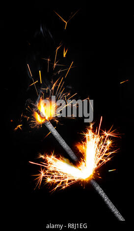 burning sparkler close-up on a black background Stock Photo