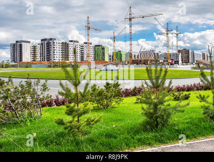 Innopolis, Russia - June 11, 2018: New modern apartment buildings under construction with cranes. Innopolis - innovative city in Tatarstan, Russia Stock Photo