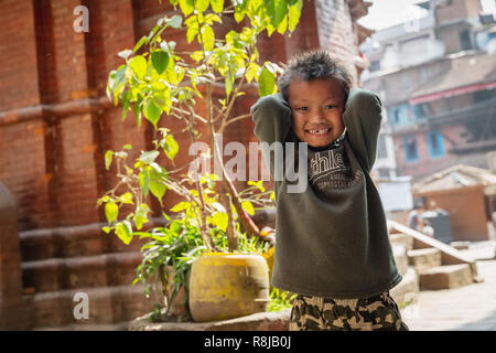 Laughing young Nepali Boy in Kathmandu, Nepal Stock Photo
