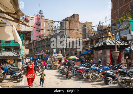 People walking through urban shopping area in Kathmandu, Nepal Stock Photo