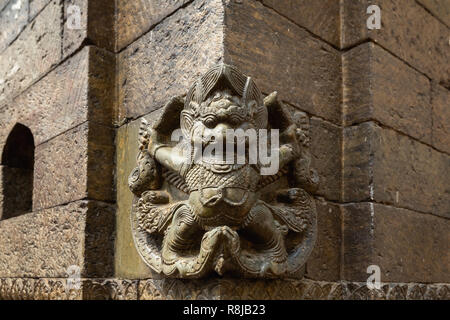Hindu god carved on the outside of Sacred Hindu Pashupatinath Temple in Kathmandu, Nepal Stock Photo