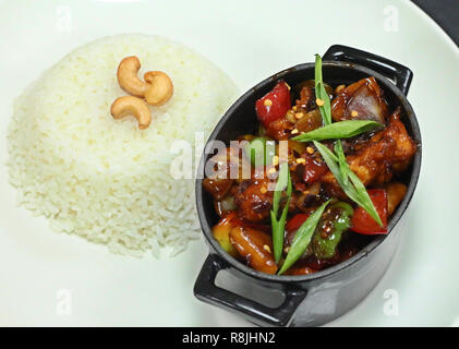 Chinese chili chicken with white rice Stock Photo