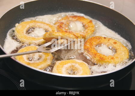 Breaded Zucchini Rings in Frying Pan Closeup Stock Photo