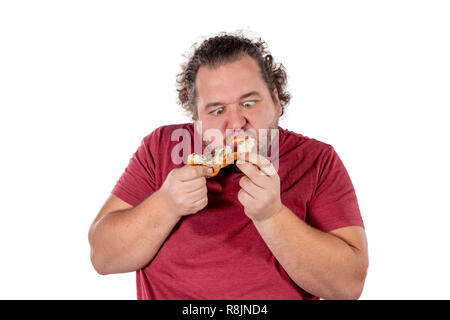 Funny fat man eating croissant Stock Photo