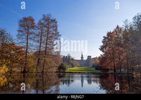 Autumn in Sempione Park with Sforzesco castle on the background in Milan, Italy. Stock Photo