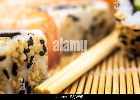 Close-up of sliced sushi rolls. Stock Photo