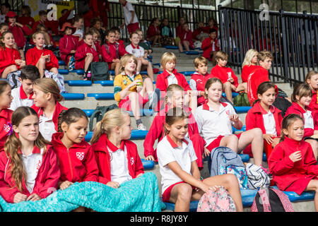 School boys and girls in sports uniform at a primary school sports day in Sydney,Australia Stock Photo