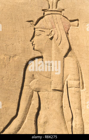 Egyptian Pharaoh Queen Engraved on Stone Wall Stock Photo