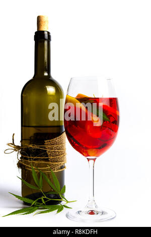 Red wine with marijuana isolated on white background Stock Photo