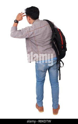 Photo image portrait of a young Asian male student standing and looking forward, rear view, isolated on white Stock Photo
