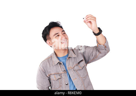 Photo image portrait of a cute young Asian male student standing and writing empty blackboard copy space, isolated on white Stock Photo