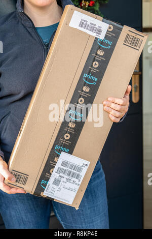 PARIS, FRANCE - DECEMBER 16, 2018: An Amazon Prime package delivered to a residential home Stock Photo