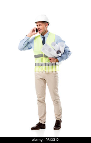 dissatisfied engineer holding blueprints and talking on smartphone isolated on white Stock Photo
