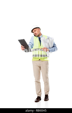 engineer holding blueprints, talking on smartphone and looking at clipboard isolated on white Stock Photo
