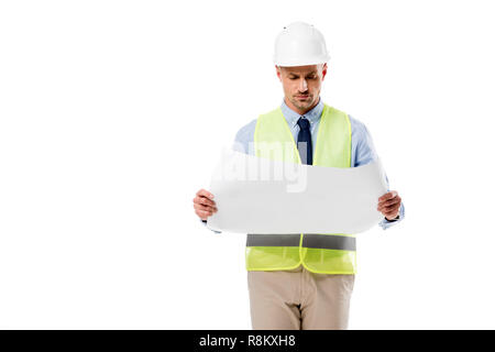 focused engineer in helmet holding blueprint isolated on white Stock Photo
