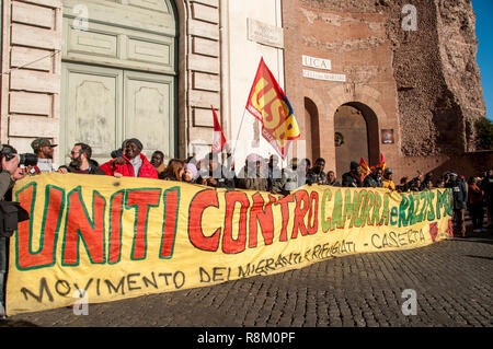 Rome, Italy. 15th Dec, 2018. 'Get Up Stand Up for Your Rights'. This is the name of the demonstration launched in Rome by the Usb base syndicate, which saw thousands of migrant agricultural workers and large-scale distribution workers, students, unemployed, precarious, ask for residence permits for all, social justice, rights and dignity against anti-social policies, racism and the Salvini decree. Many protesters wore yellow vests, inspired by protests in France. Credit: Patrizia Cortellessa/Pacific Press/Alamy Live News Stock Photo