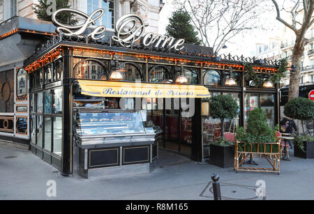 The famous restaurant Le Dome decorated for Christmas located on Montparnasse boulevard in Paris.It was once home for to intellectual stars , from Hemingway to Picasso Stock Photo