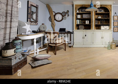 Concept of interior of the room where lives engineer. Interior of the room in the style of mechanician. Stock Photo