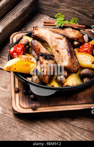 Grilled ribs on an old vintage pan.Summer BBQ Stock Photo