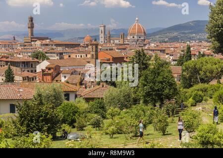 Italy, Tuscany, Florence, historic center listed as World Heritage by UNESCO, general view with the Palazzo Vecchio and the Duomo since the garden Giardino delle Rose Stock Photo