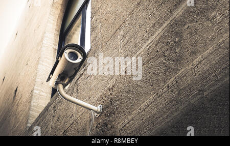 cctv security camera background spy street look wall Stock Photo
