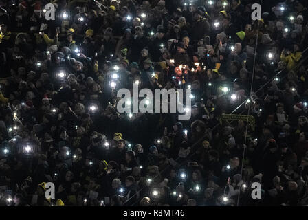 Dortmund, Germany. 16th Dec, 2018. The lamps of innumerable mobile phones light up the largest Christmas song in Germany at Signal Iduna Park, according to the organisers. 50,000 singers were expected in the BVB stadium. Credit: Bernd Thissen/dpa/Alamy Live News