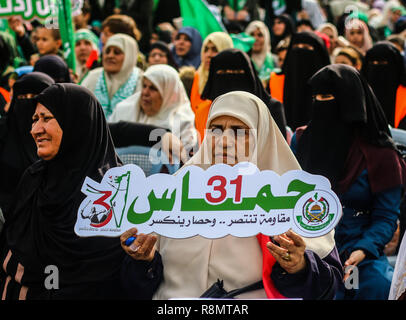 Gaza, Palestine. 16th Dec 2018. Thousands of Palestinians gather for a rally in the centre of Gaza City to celebrate Hamas 31th anniversary on 16th December 2018. Credit: ZUMA Press, Inc./Alamy Live News Credit: ZUMA Press, Inc./Alamy Live News Stock Photo