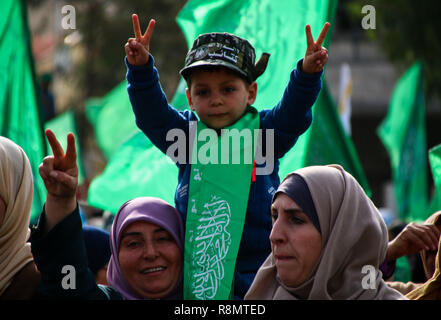 Gaza, Palestine. 16th Dec 2018. Thousands of Palestinians gather for a rally in the centre of Gaza City to celebrate Hamas 31th anniversary on 16th December 2018. Credit: ZUMA Press, Inc./Alamy Live News Credit: ZUMA Press, Inc./Alamy Live News Stock Photo