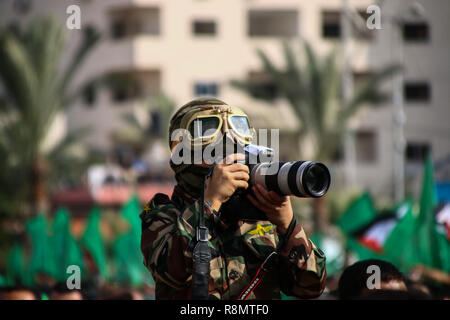 Gaza, Palestine. 16th Dec 2018. Thousands of Palestinians gather for a rally in the centre of Gaza City to celebrate Hamas 31th anniversary on 16th December 2018. Credit: ZUMA Press, Inc./Alamy Live News Credit: ZUMA Press, Inc./Alamy Live News Stock Photo