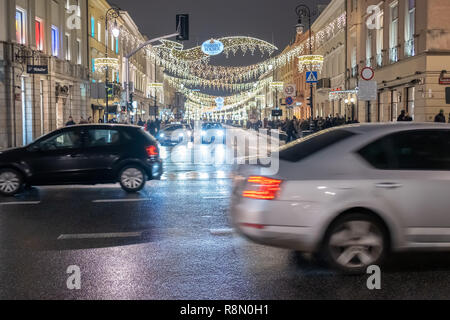 Warsaw, Poland. 16th December, 2018.  Christmas season lights are a major attraction for tourists and residents every year. Several kilometers of city streets including Royal Route are decorated with thousands of lamps. Robert Pastryk / Alamy Live News Stock Photo