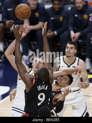 Denver, Colorado, USA. 16th Dec, 2018. Nuggets NIKOLA JOKIC, left, battles for a rebound during the 2nd. Half at the Pepsi Center Sunday evening. The Nuggets beat the Raptors 95-86. Credit: Hector Acevedo/ZUMA Wire/Alamy Live News Stock Photo