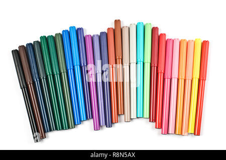 Colored felt tip pens in a row on white background. Stock Photo